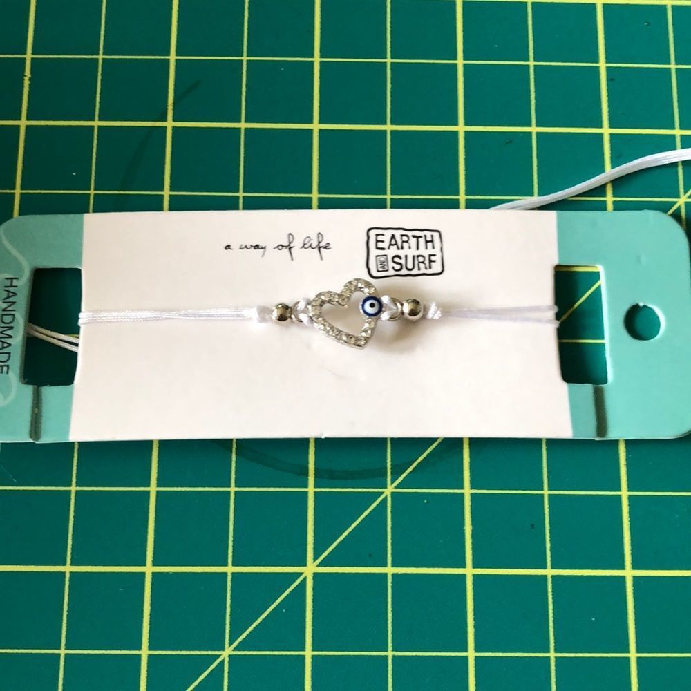 Earth and surf handmade white slid bracelet